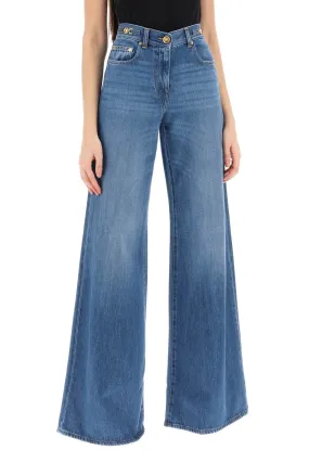 flared jeans with medusa '95