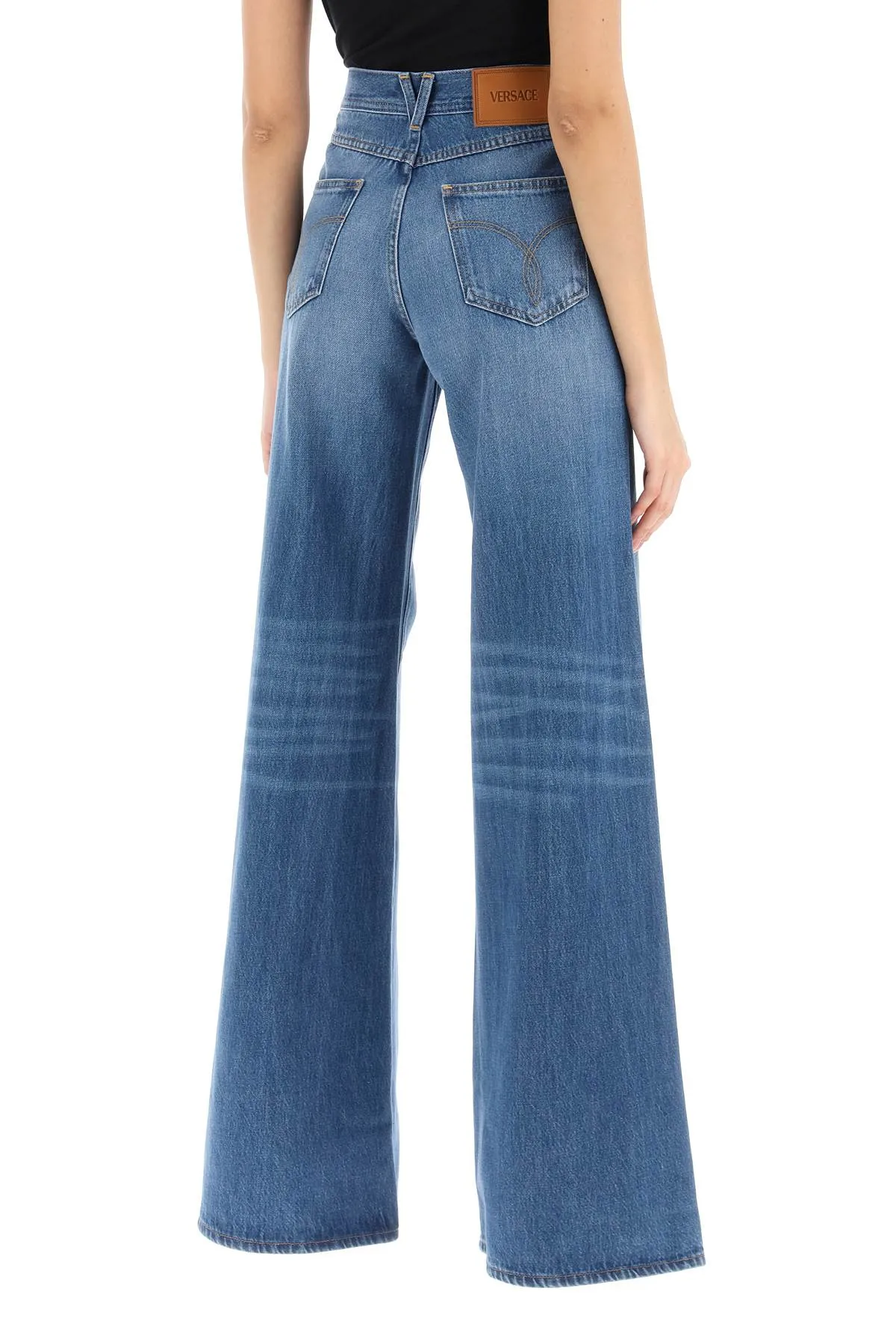 flared jeans with medusa '95